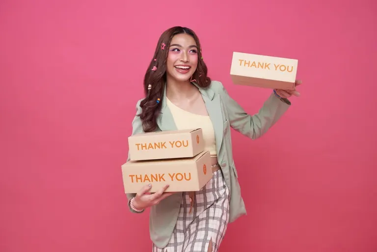 Asian women holding packaging box ready to delivery,Entrepreneur or freelance Startup small business SME and o